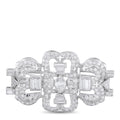 Platinum diamond brooch with openwork floral design and rectangular center stones