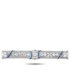 Art Deco platinum bar pin with diamonds and blue sapphires, geometric settings