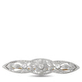 Platinum diamond brooch with engraved leaf oval and central round flower stone
