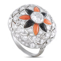 Diamond ring with onyx and coral, oval center stone and floral halo in silver