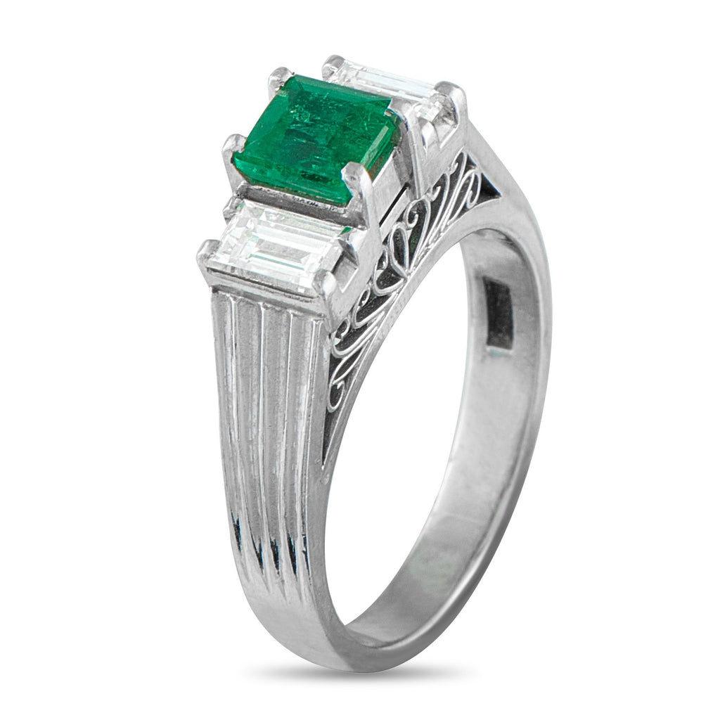Exclusive Platinum 0.60ct Diamond and Emerald Ring