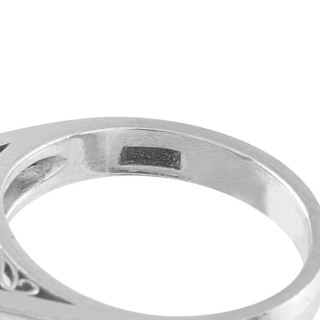 Exclusive Platinum 0.60ct Diamond and Emerald Ring