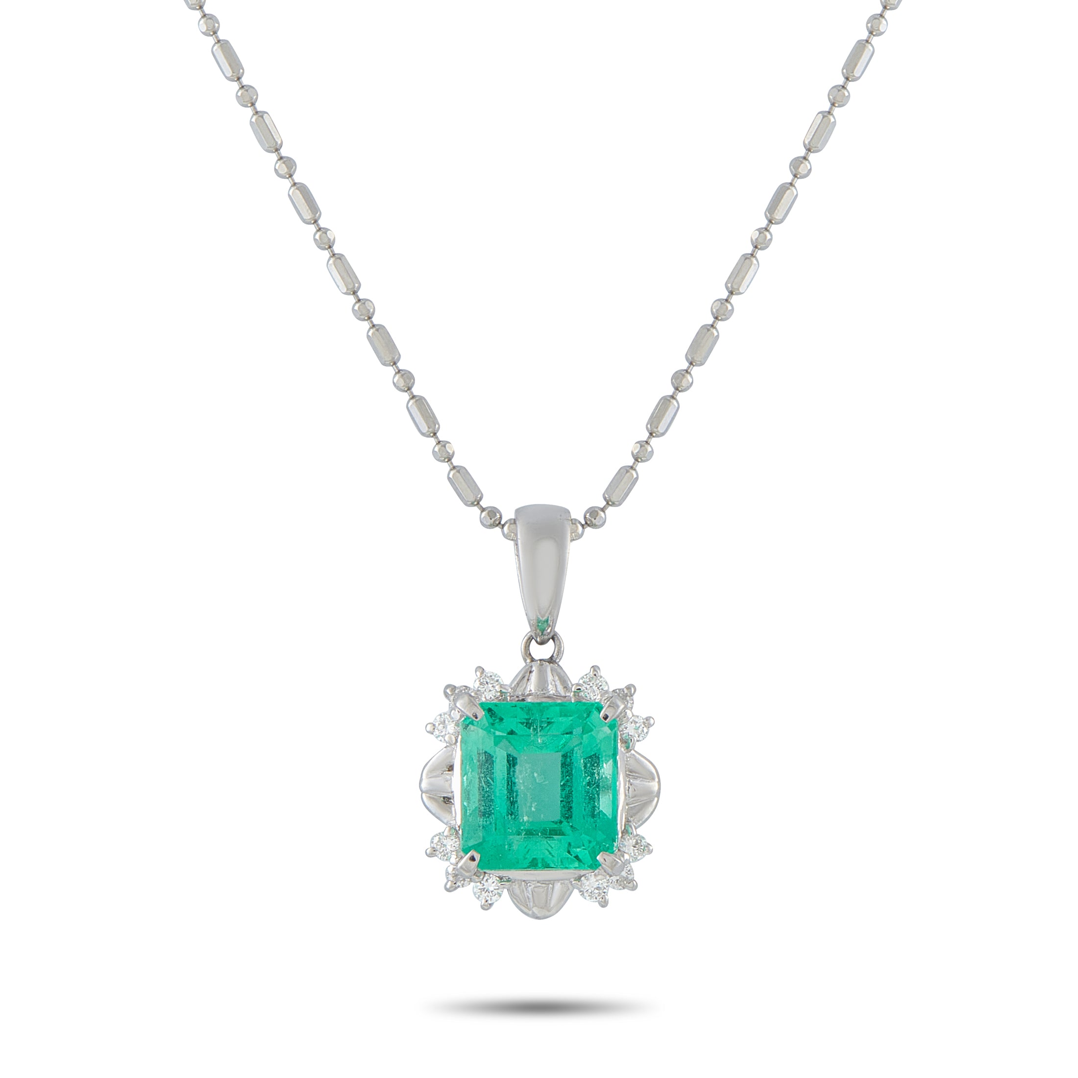 Platinum 0.16ct Diamond and Emerald Pendant