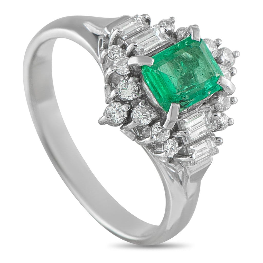 Platinum 0.46ct Diamond and Emerald Ring - This opulent ring will continually capture your imagination. A radiant 0.46 carat Emerald center stone adds a luxurious pop o