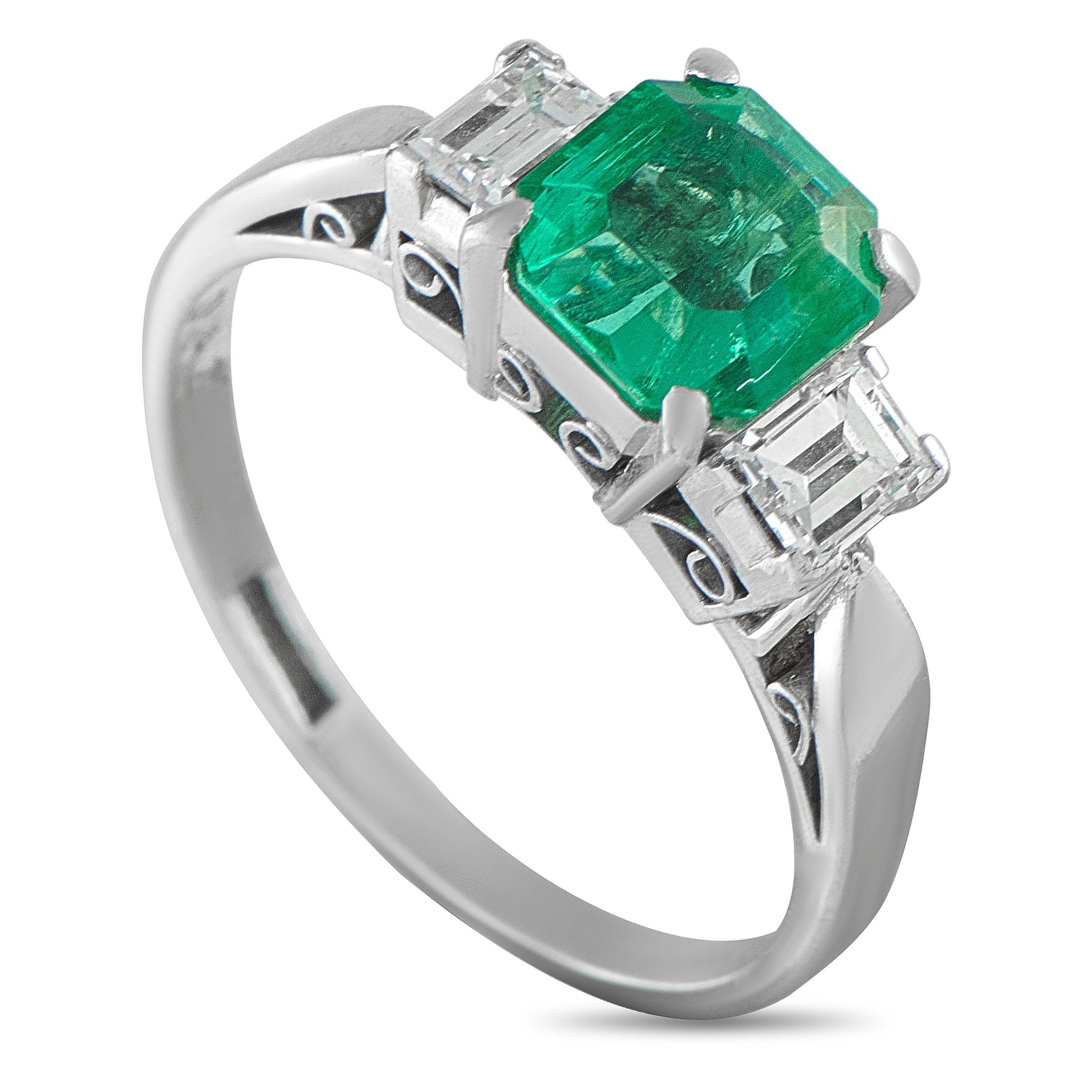 Platinum 0.42ct Diamond and Emerald Ring - An ornate Platinum setting makes this luxury ring interesting from every angle. Classic and incredibly chic, it features a 1.