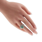 Platinum 0.65ct Diamond and Emerald Ring