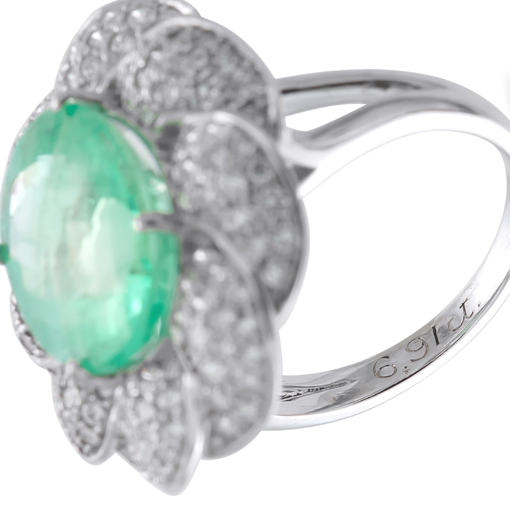 Platinum 0.65ct Diamond and Emerald Ring