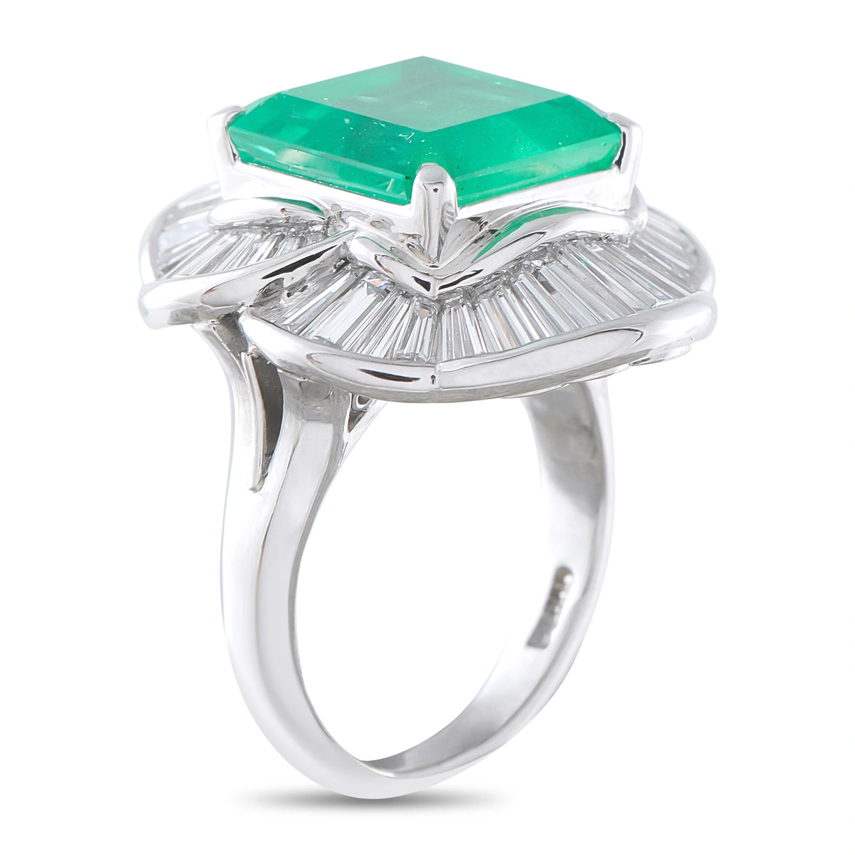 Platinum ballerina ring with emerald-cut green center and diamond fan side details