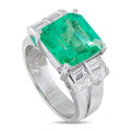 Platinum emerald-cut emerald and baguette diamond ring with faceted green center