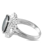 Exclusive Platinum 1.01ct Diamond and Green Sapphire Ring