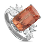 Exclusive Platinum 0.68ct Diamond and Imperial Topaz Ring - A breathtaking 8.13 carat Imperial Topaz gemstone shines brightly at the center of this luxury ring. Set in Platinum, sparkli