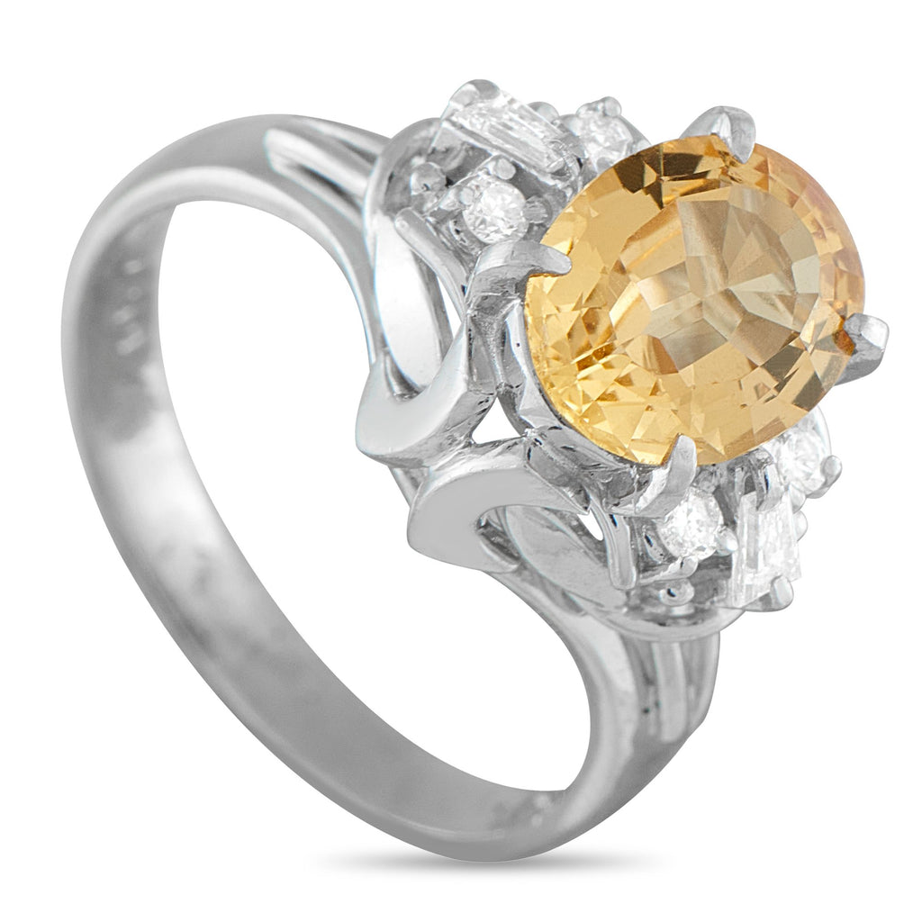 Exclusive Platinum 0.16ct Diamond and Imperial Topaz Ring - A breathtaking 1.67 carat Imperial Topaz center stone is beautifully showcased by an ornate Platinum setting on this luxury r