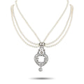 Multi-strand pearl necklace with diamond-like heart pendant and drop clasp
