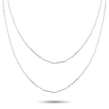 Two-row diamond necklace with small round stones on a slender chain