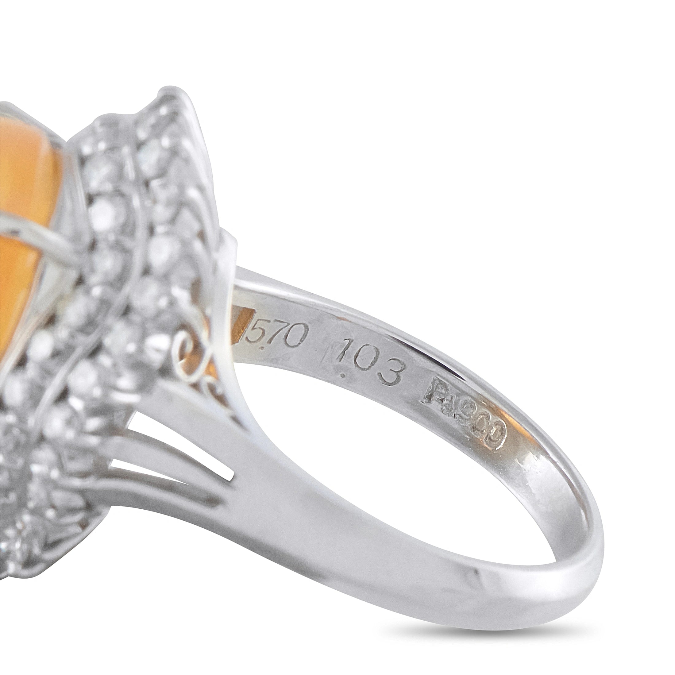 Platinum ring band with engraved 1.03 and close view of opal and diamond halo