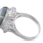 Platinum opal and diamond ring showing inside band, prongs, and stamped hallmark
