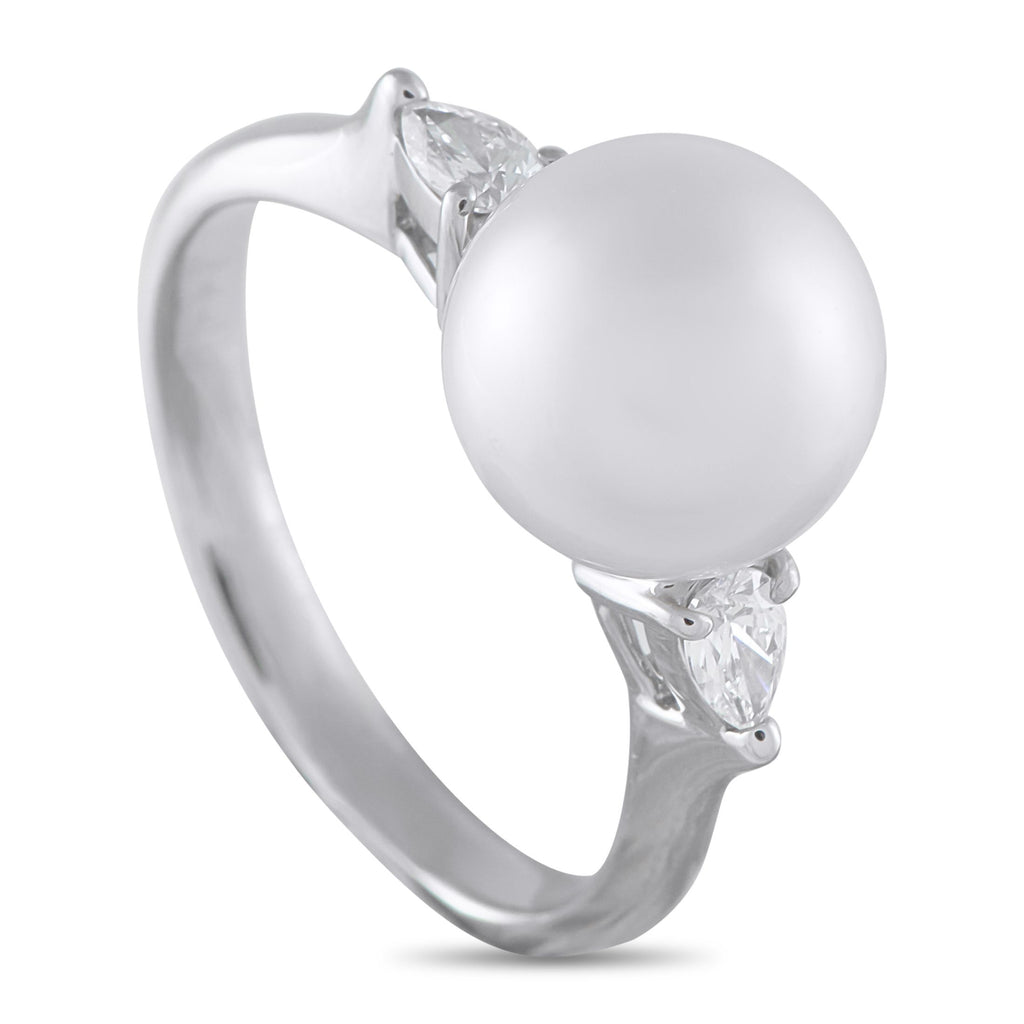 Exclusive Platinum 0.28ct Diamond and Pearl Ring - A 10.4mm white pearl, glowing between pear-shaped diamonds, sits high and luminous on a delicate 3mm-slim platinum band. The