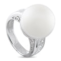 Platinum ring with large white pearl and side diamond accents