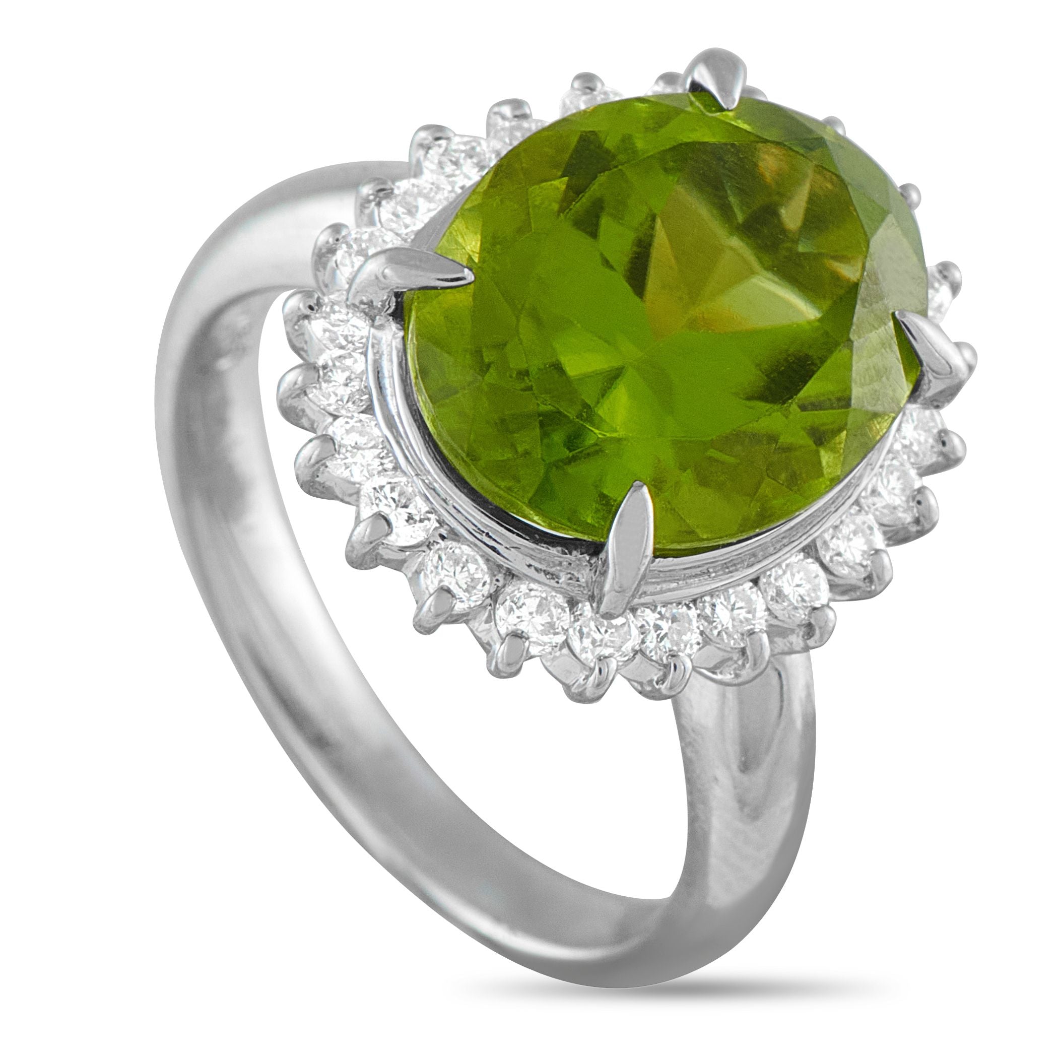 Exclusive Platinum 0.50ct Diamond and Peridot Ring - Add a stylish pop of color to any ensemble with this timeless luxury ring. A 6.57 carat green Peridot center stone makes it i