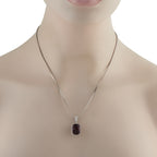 Platinum 0.80ct Diamond and Rhodolite Garnet Pendant