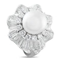 Platinum ring with round pearl centerpiece and baguette-cut diamond halo