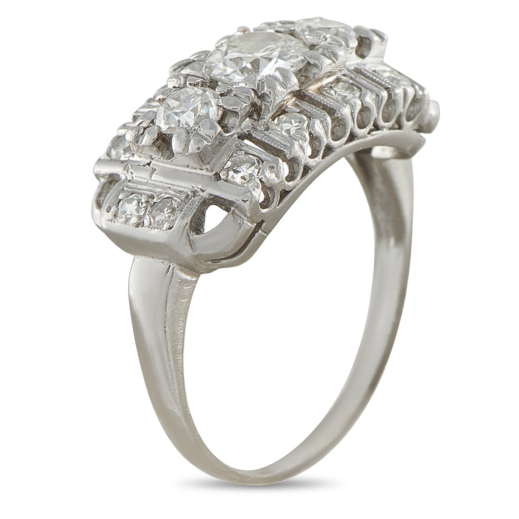 Platinum art deco diamond ring, side view with bezel-set round stones
