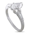 Platinum diamond solitaire ring with large square-cut center stone and four-prong setting