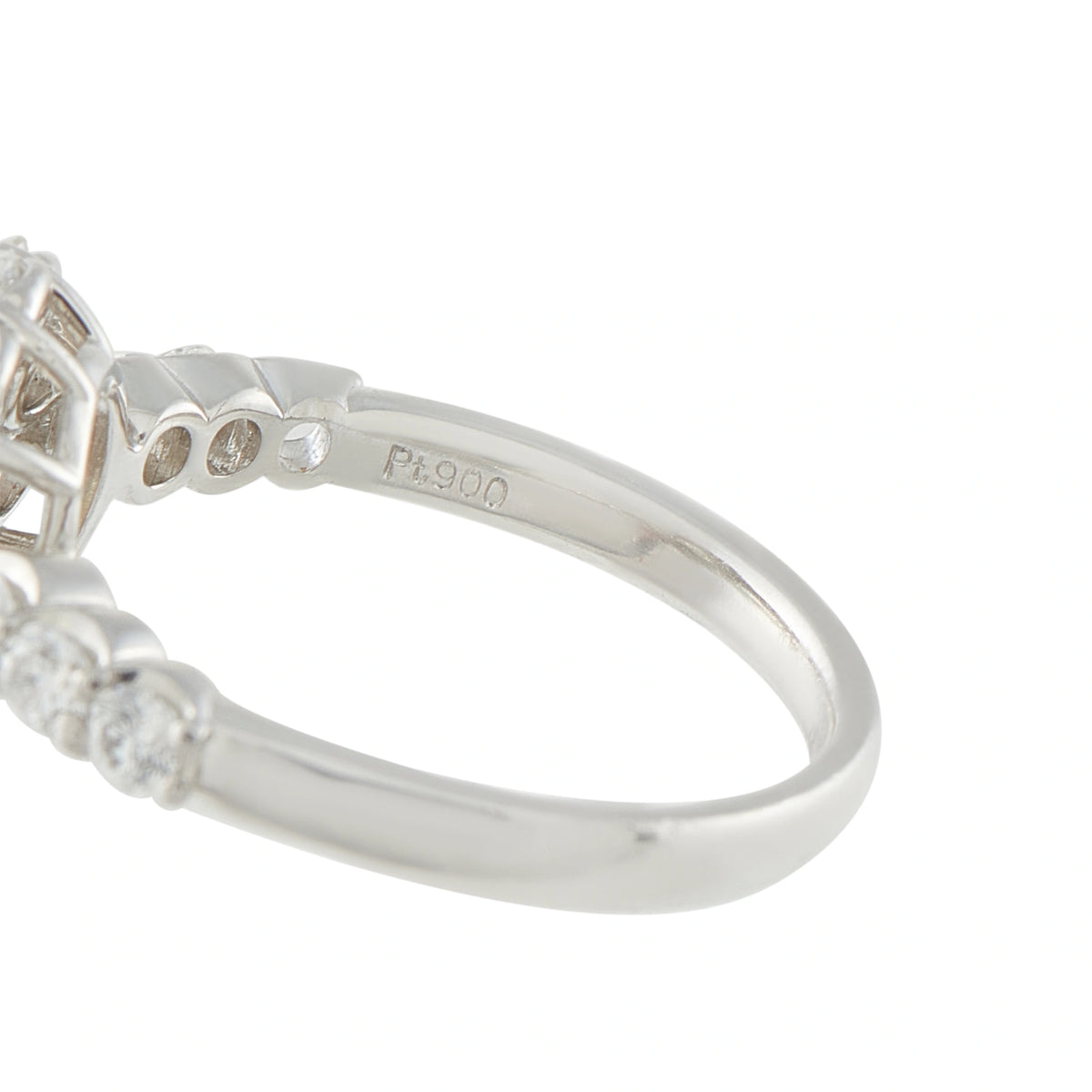 Platinum diamond ring close-up showing the band and Pt900 hallmark