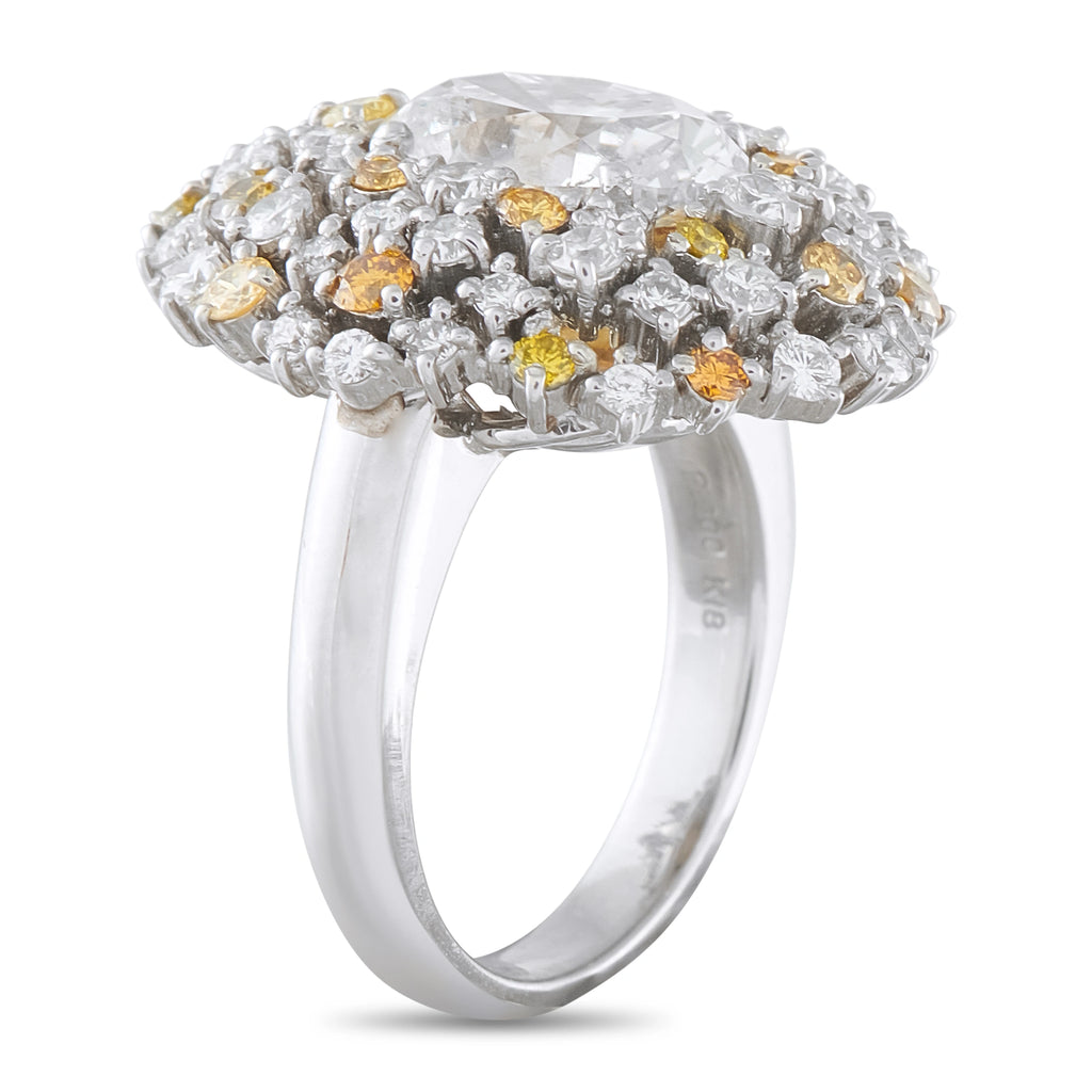 Platinum diamond ring, side view of the raised cluster setting and smooth band