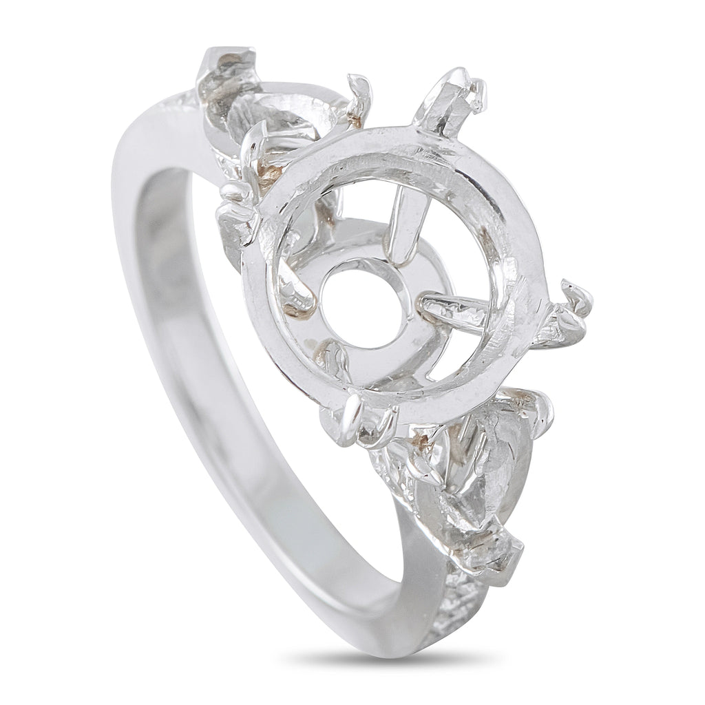 Platinum diamond mounting ring with round center halo and prong-set stones