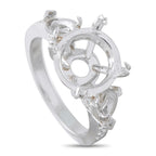 Platinum diamond mounting ring with round center halo and prong-set stones