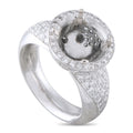 Platinum diamond halo mounting ring with round center setting