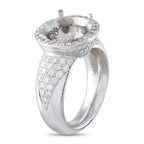 Platinum diamond halo ring with split shank and round center bezel