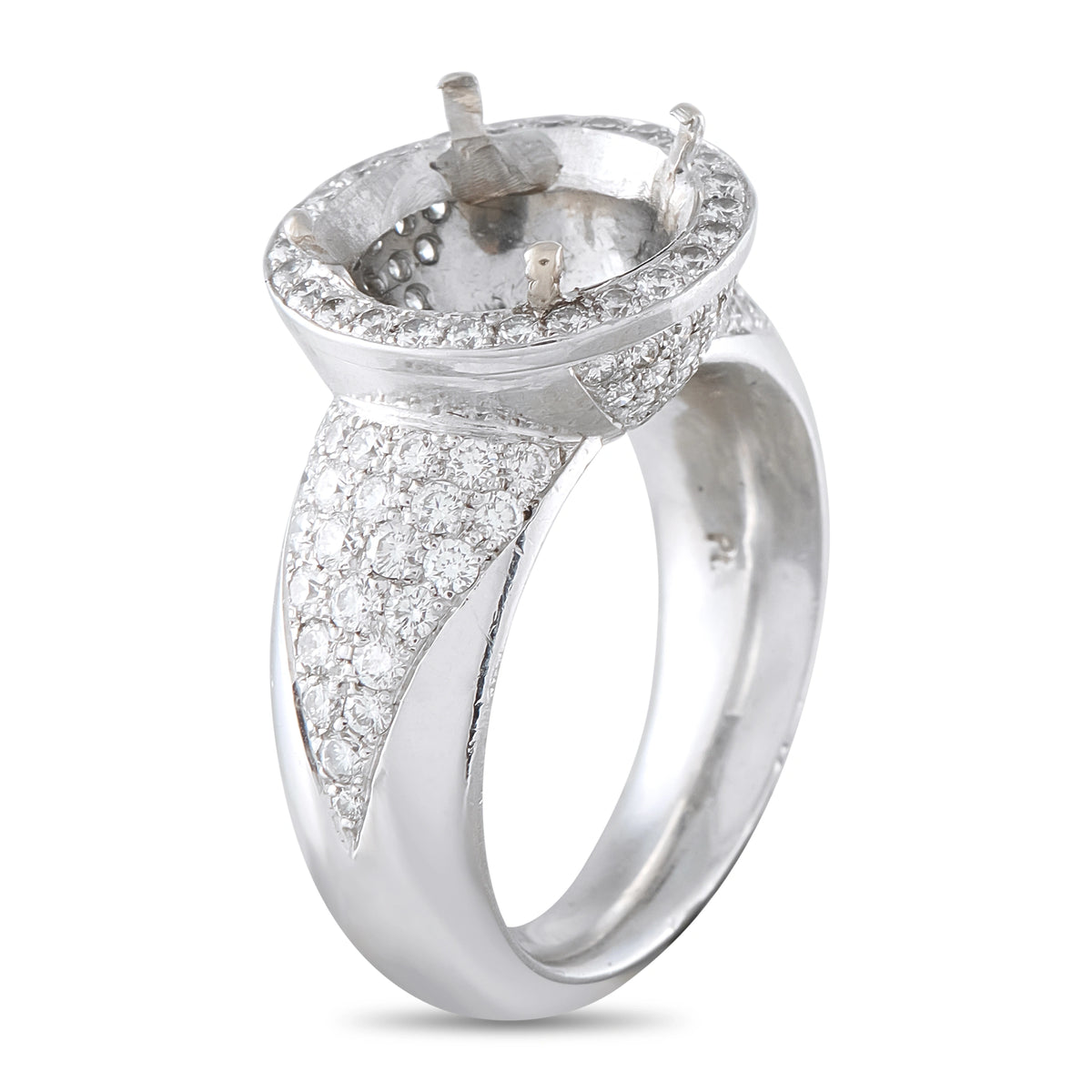 Platinum diamond halo ring with split shank and round center bezel