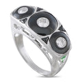 Platinum tone ring with black onyx ovals and round diamond accents in bezel settings
