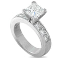 Platinum diamond engagement ring with square center stone and side baguette diamonds
