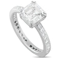 Platinum diamond ring with square-cut center stone and pavé band