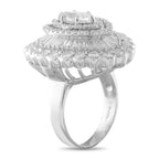 Diamond halo ring with baguette and round side stones, center stone visible