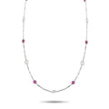 Platinum necklace with red ruby round stones and small clear diamond-like accents
