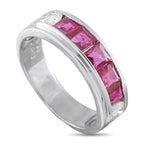 Platinum 0.23ct Diamond and Ruby Ring - This ring’s seamless stream of deep crimson immediately catches attention. An  piece, this ring features a 5mm platinum band