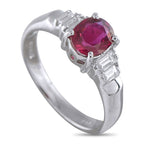 Exclusive Platinum 0.20ct Diamond and Ruby Ring - This platinum ring showcases an oval 0.86-carat ruby center stone, accented by stepped side stones of baguette diamonds. The