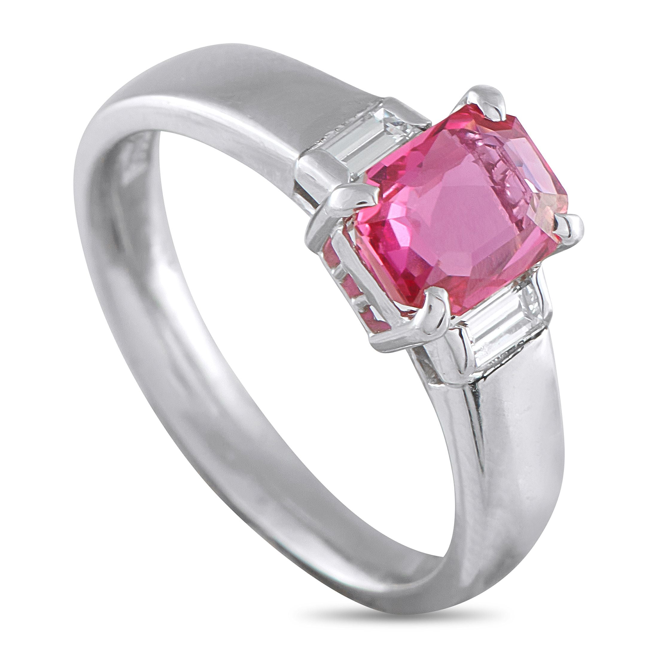 Exclusive Platinum 0.17ct Diamond and Ruby Three-Stone Ring - Clean lines define the elegant look of this three-stone platinum ring. It features a 1.45-carat radiant-cut ruby secured by f