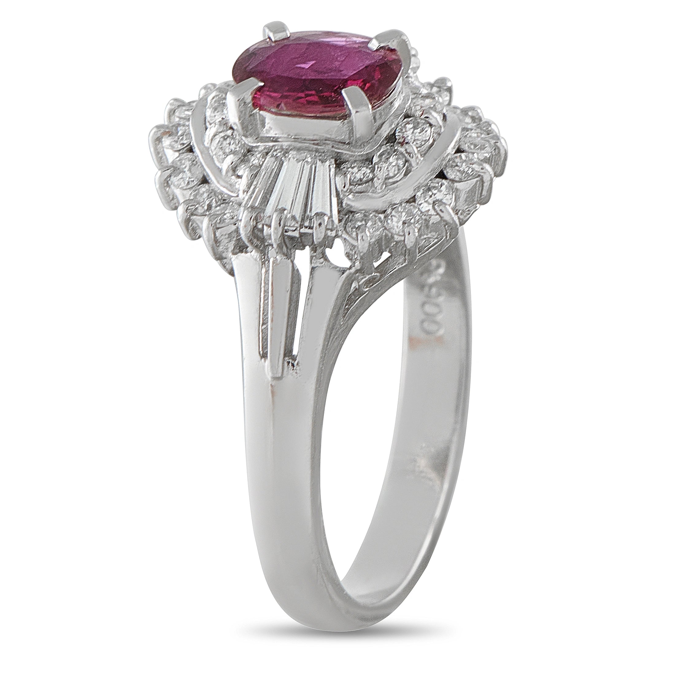 Platinum ring with oval ruby center, diamond halo, side prongs visible