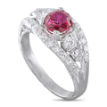 Platinum diamond and ruby ring with round ruby center stone and split shank
