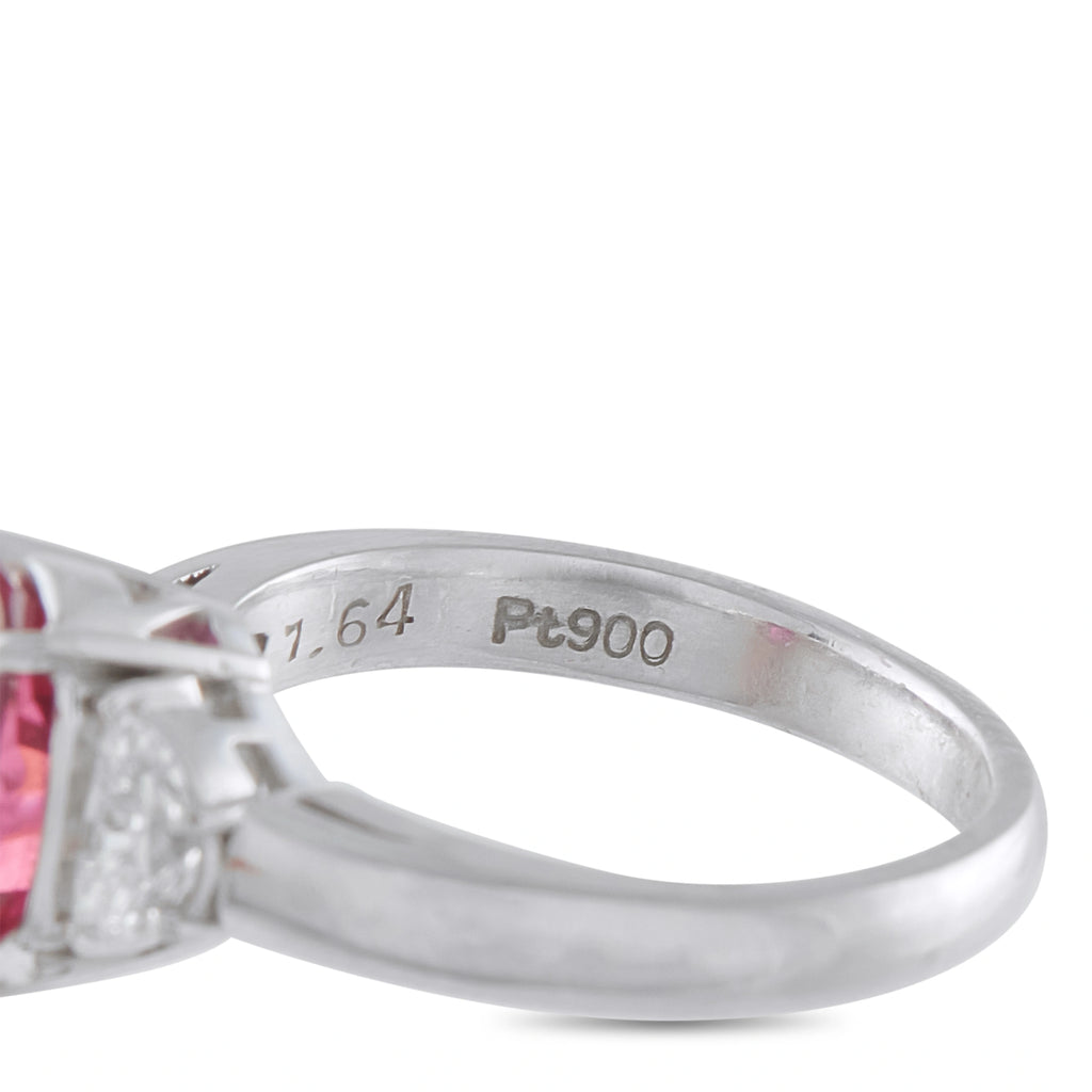 Platinum ring band close-up showing the 1.64 and Pt900 engravings