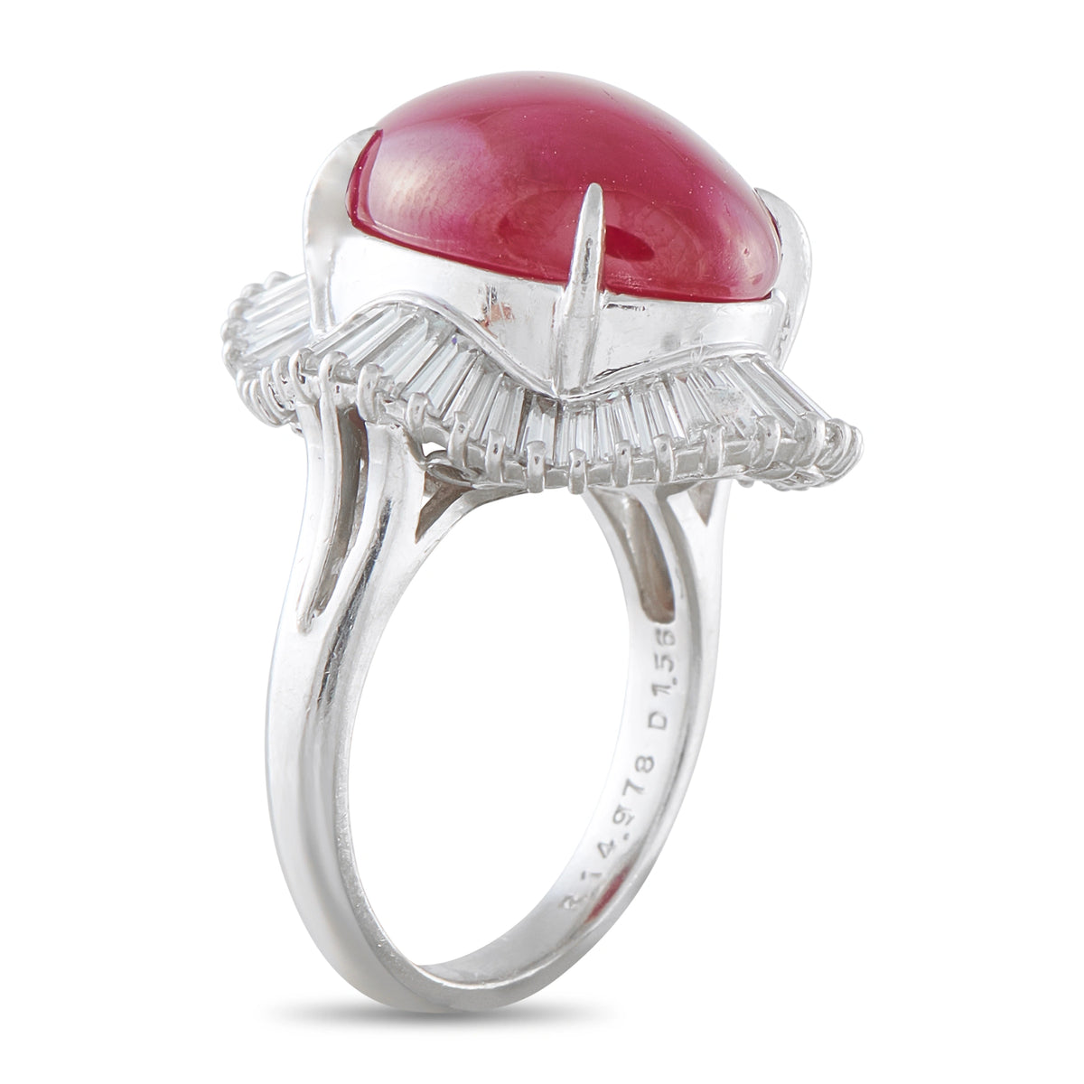 Platinum ruby and diamond ring, shown from the side with its split shank and raised setting