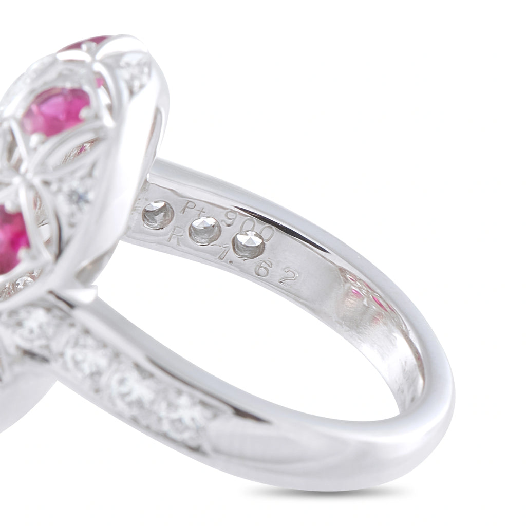 Platinum ring shank close-up with engraved hallmark and ruby cluster setting