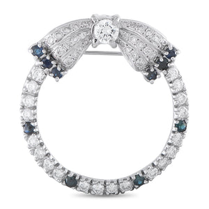 Vintage Platinum 1.50ct Diamond and Sapphire Open Circle Bow Brooch