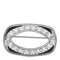 Oval brooch with round diamonds and black stones, silver-tone hinged frame