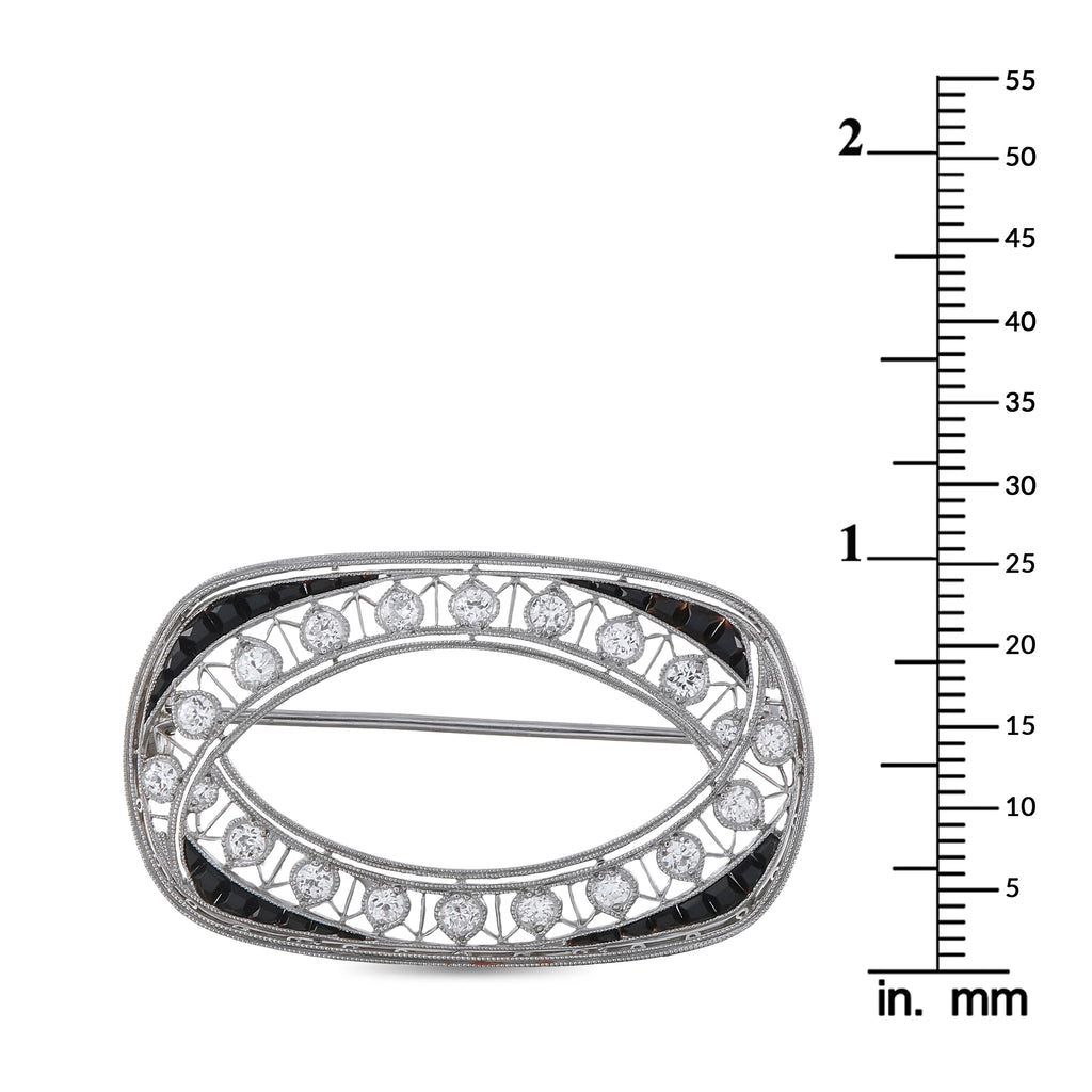 Platinum 0.80ct Diamond and Sapphire Brooch
